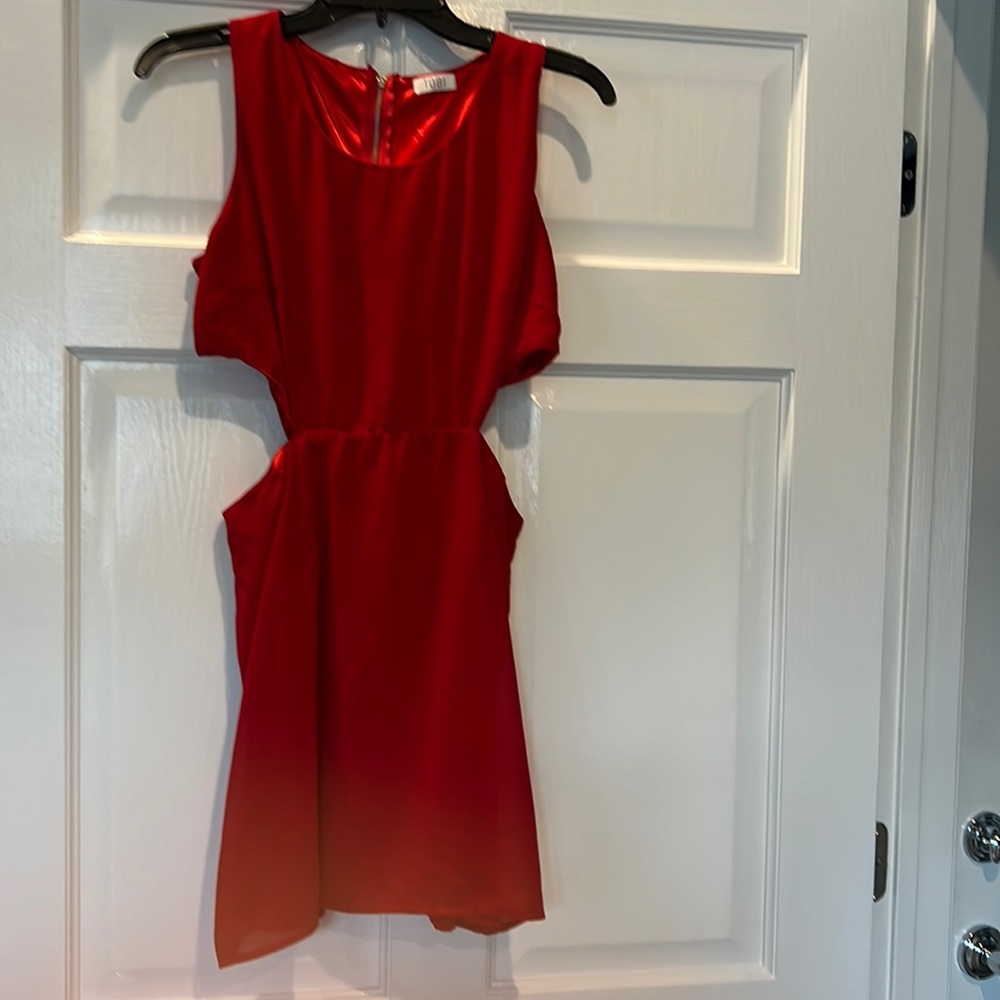 Red Tobi dress. Machine washable. Polyester